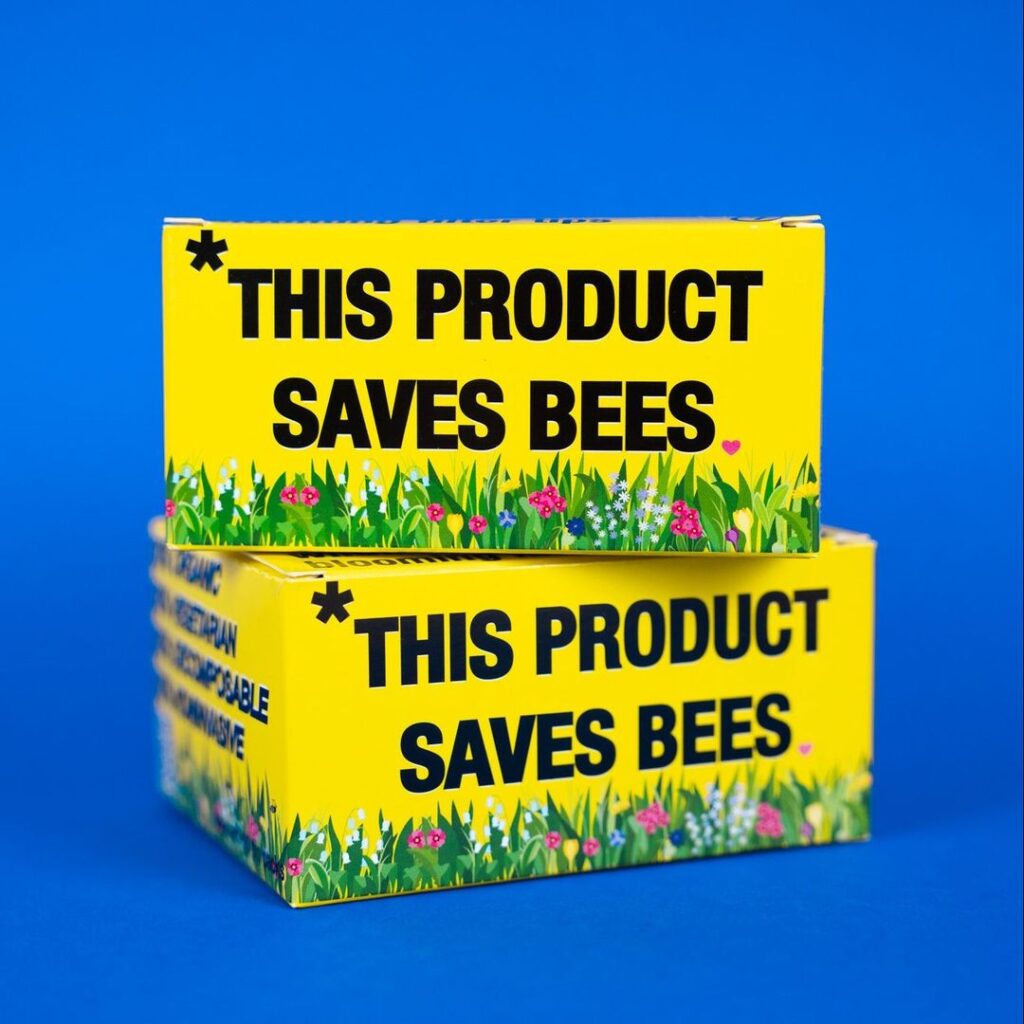 Two Bloomer Boxes Presenting "This Product Will Save Bees."