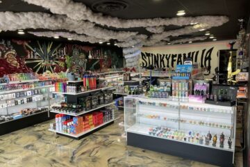 Stinky Familia smoke shop storefront in Elk Grove Village, IL - 5-star rated tobacco and vape store with eco-friendly Bloomer filter tips